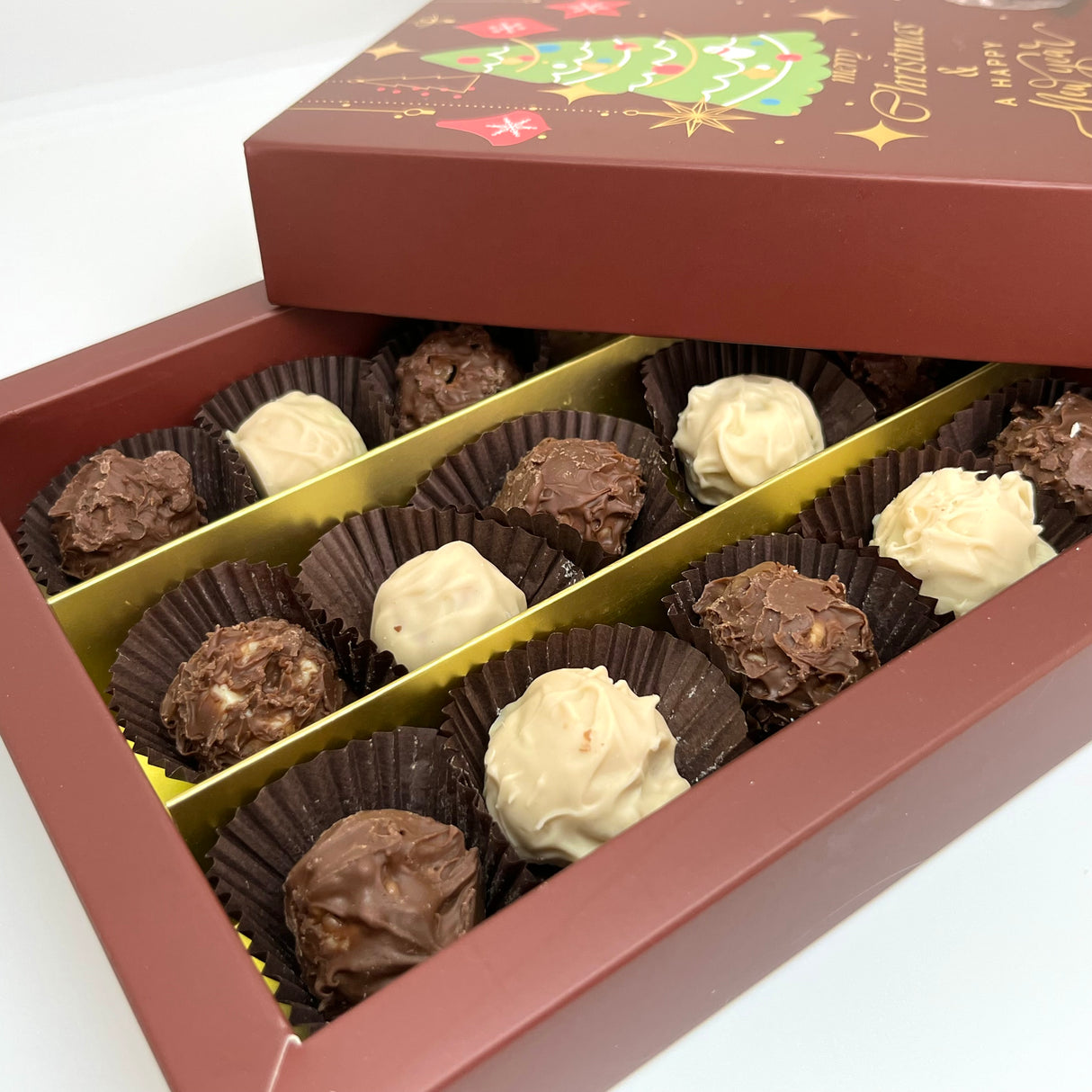 Ema Chocolate Milk and White Chocolate Truffles with Hazelnut Cream Filled- Merry Christmas Box - 250g